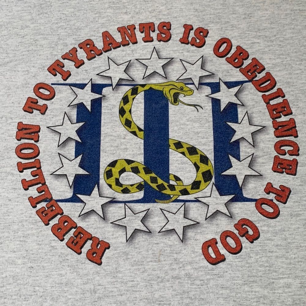 “Rebellion to Tyrants is Obedience to God” Graphic T-Shirt M Gray